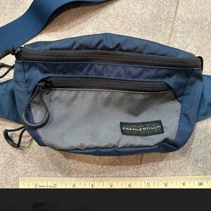 tough materials by Eberlestock. It has small, medium, and large compartments.